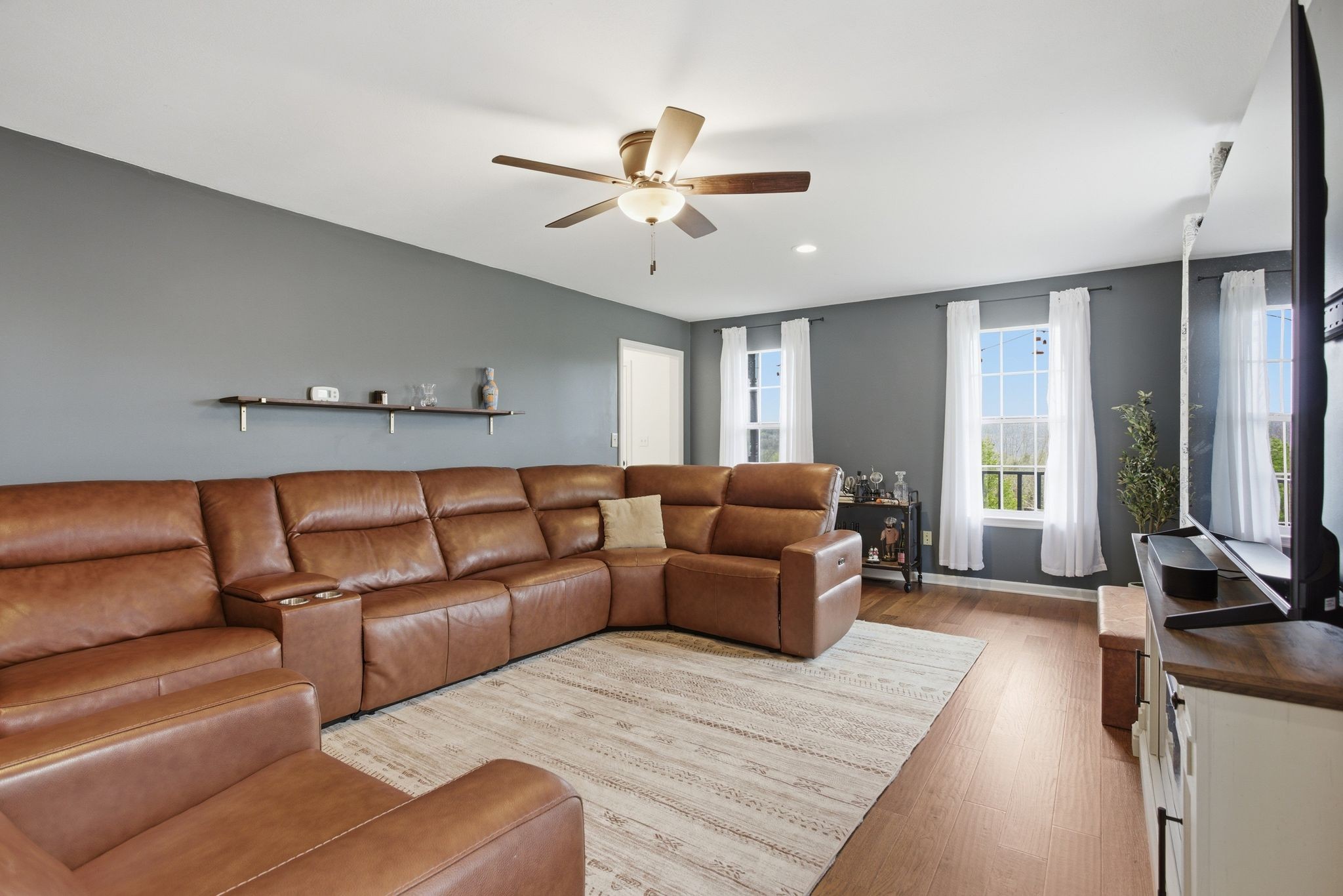 1469 Roy Sellers Road Columbia, TN 38401 - Photo 29 of 55 a living room with furniture and a large window