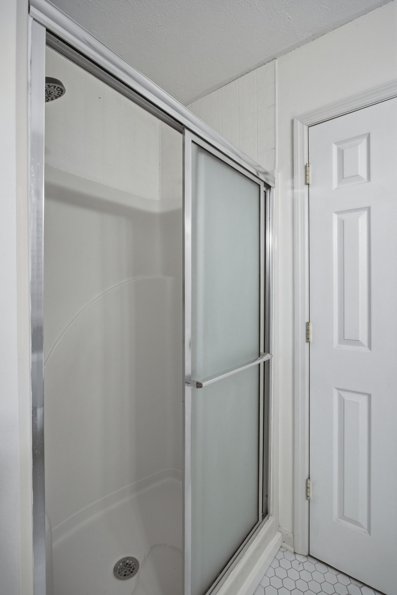1469 Roy Sellers Road Columbia, TN 38401 - Photo 42 of 55 a bathroom with a glass shower door
