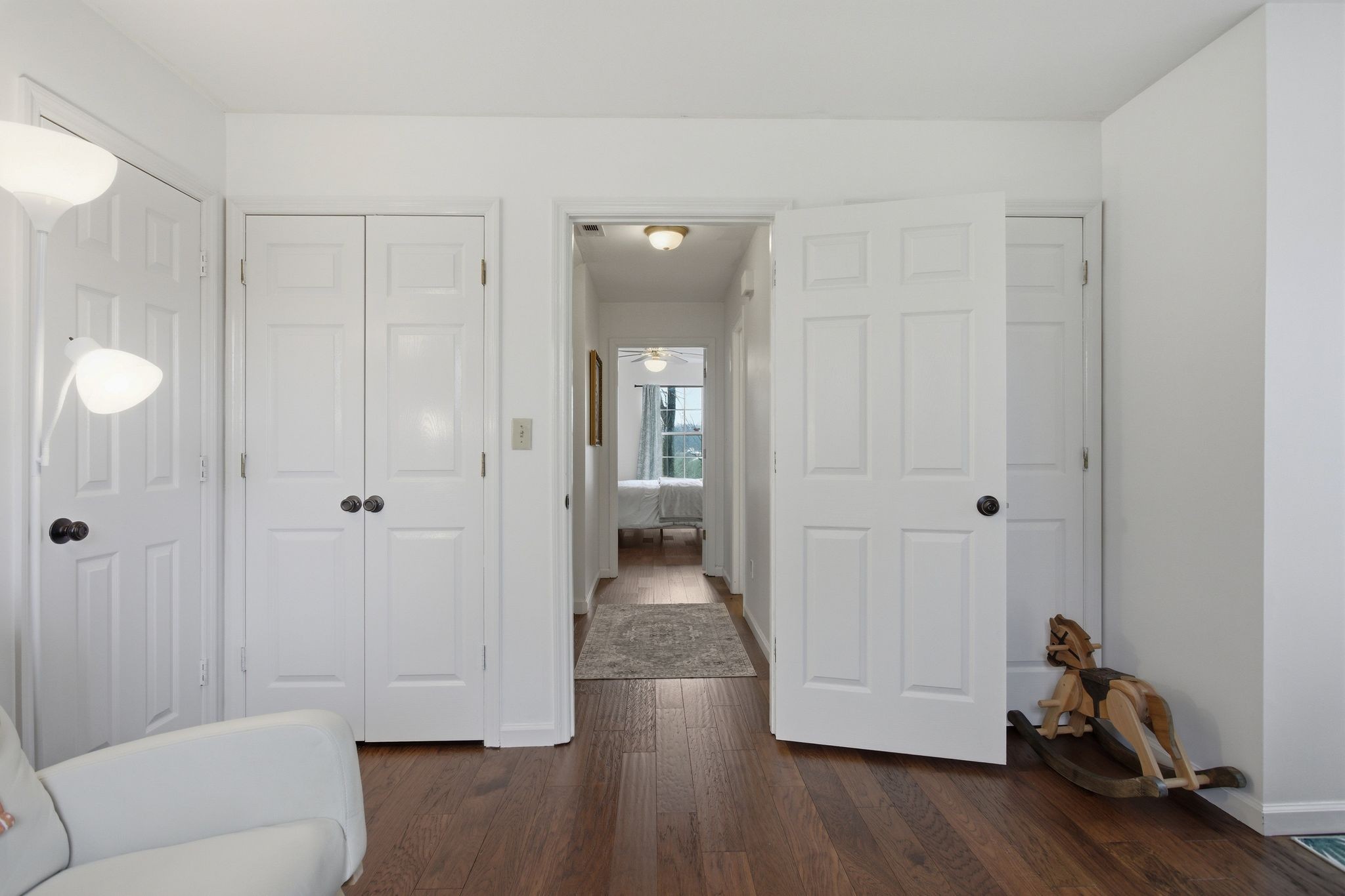1469 Roy Sellers Road Columbia, TN 38401 - Photo 46 of 55 a view of a livingroom with wooden floor and a couch