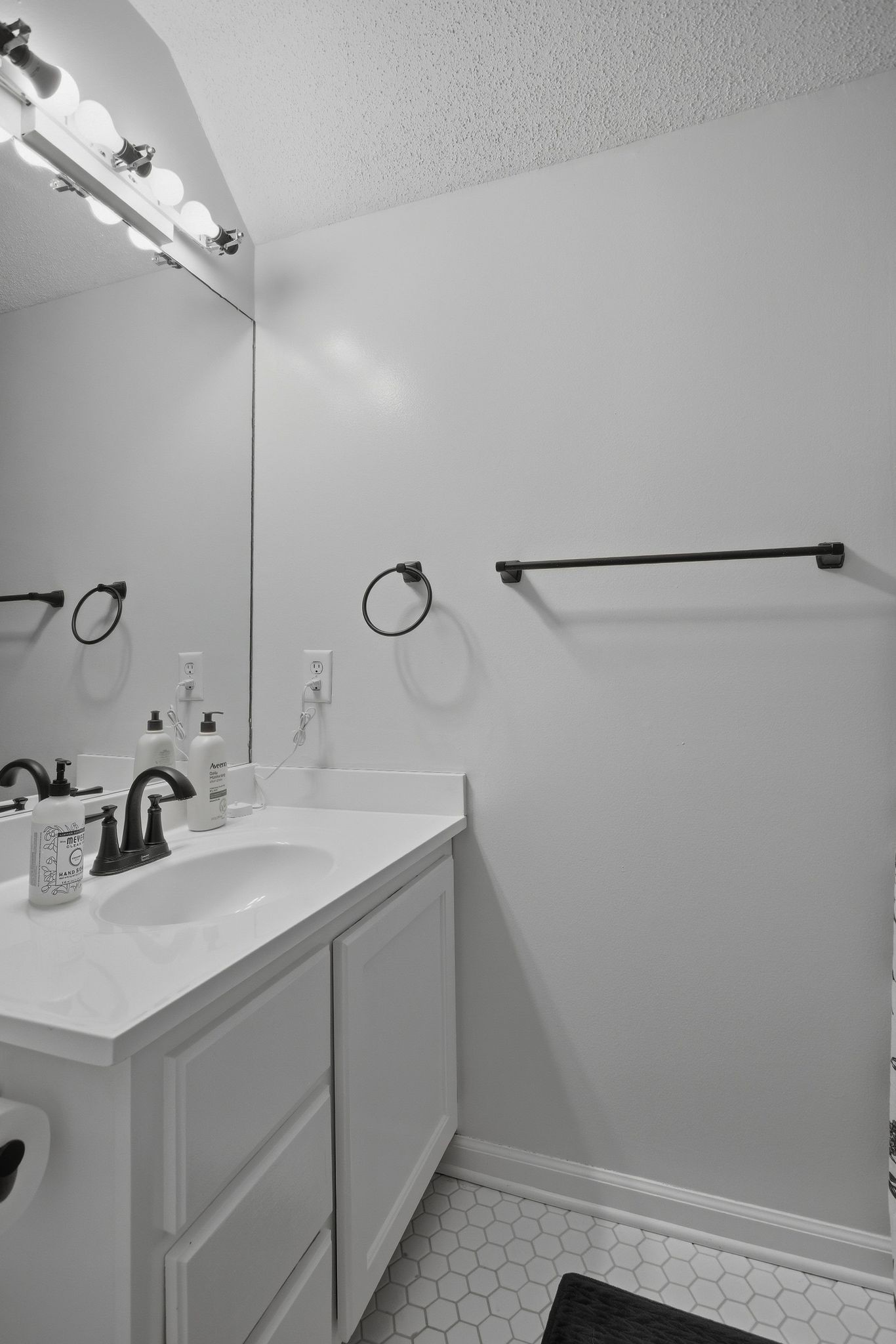 1469 Roy Sellers Road Columbia, TN 38401 - Photo 47 of 55 a bathroom with a sink and a mirror