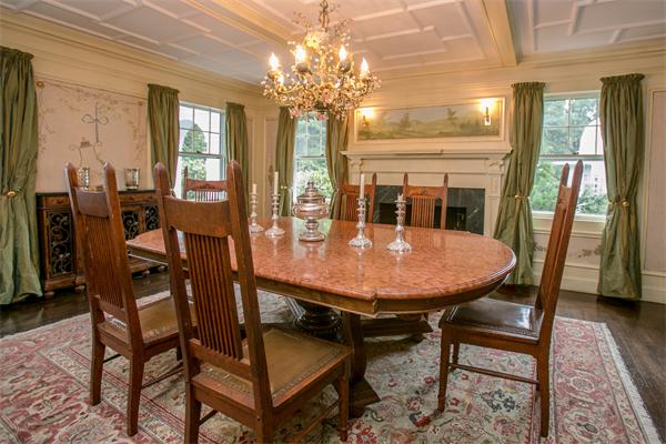 455 Glen Road Weston, MA 02493 - Photo 3 of 18 a view of a dining room with furniture and a chandelier