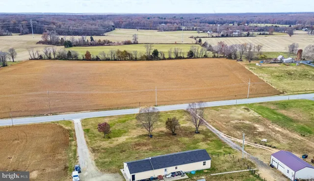 a view of a swimming pool and an outdoor space