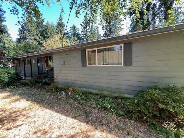 101 Brooks Road Carson, WA 98610 - Photo 16 of 16 a backyard of a house with lots of green space