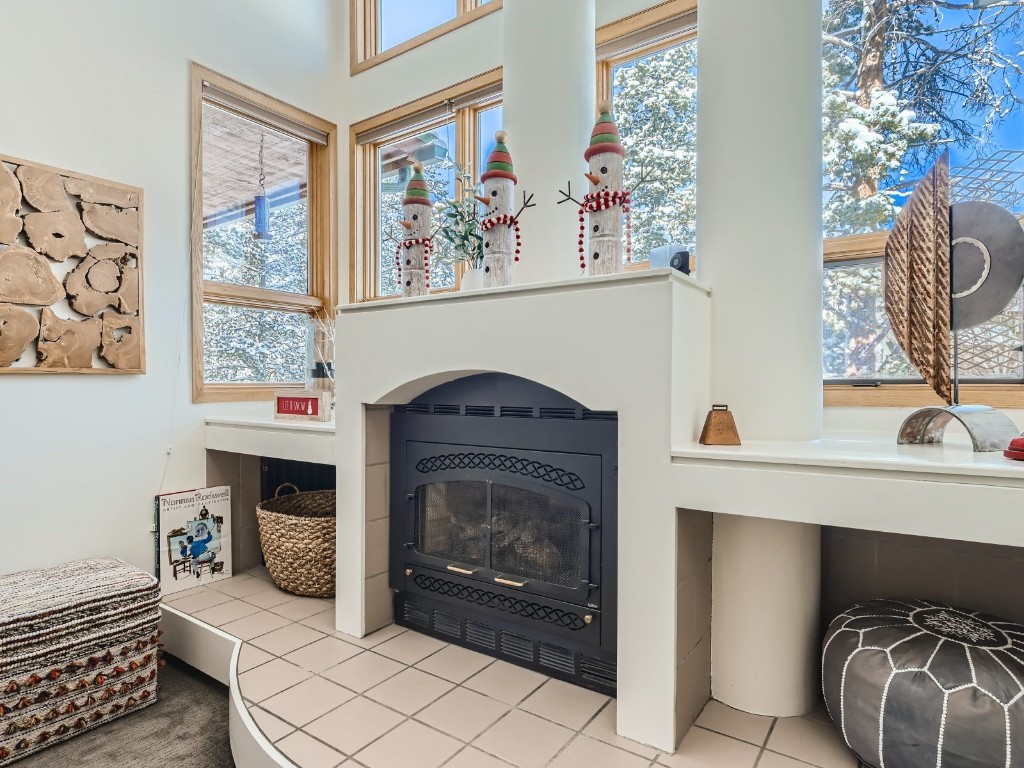 2017 Soda Ridge Road, Unit 1939 Keystone, CO 80435 - Photo 11 of 27 a living room with furniture and a fireplace