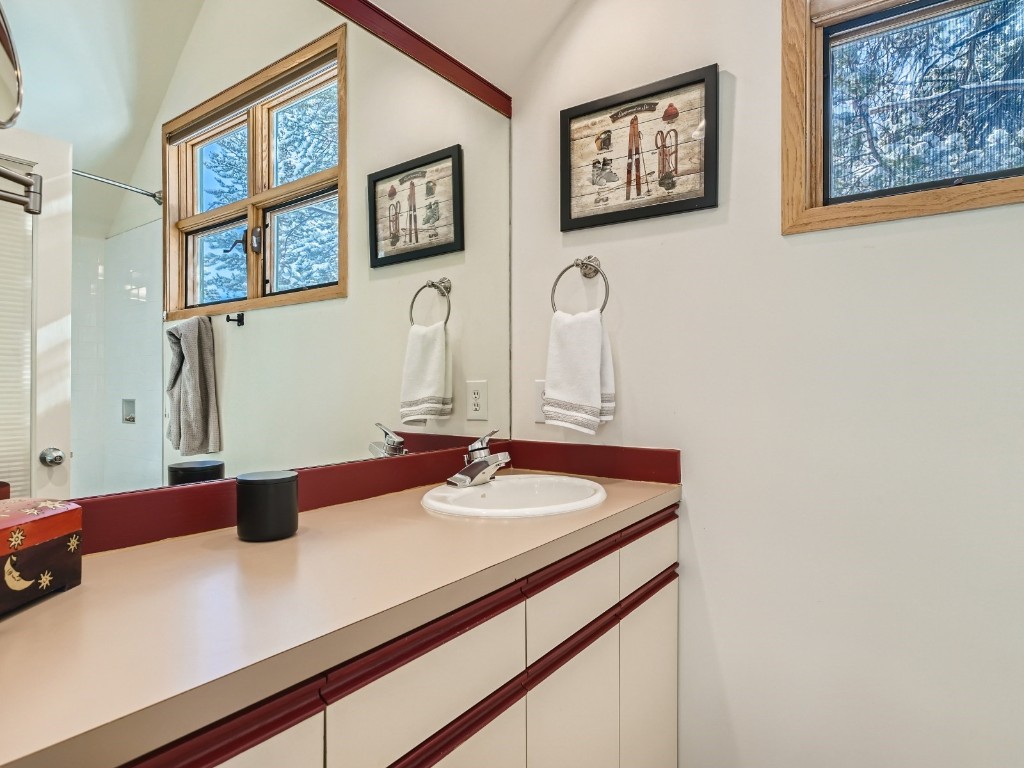 2017 Soda Ridge Road, Unit 1939 Keystone, CO 80435 - Photo 15 of 27 a bathroom with a sink and a mirror