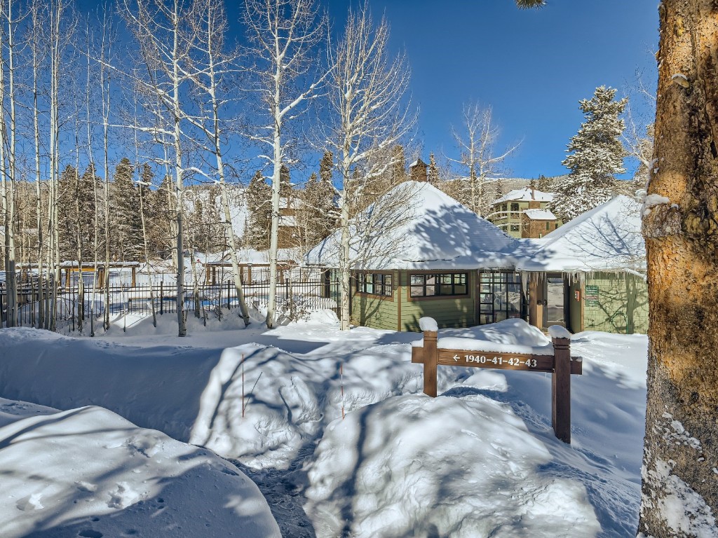2017 Soda Ridge Road, Unit 1939 Keystone, CO 80435 - Photo 23 of 27 a view of a patio with table and chairs potted plants