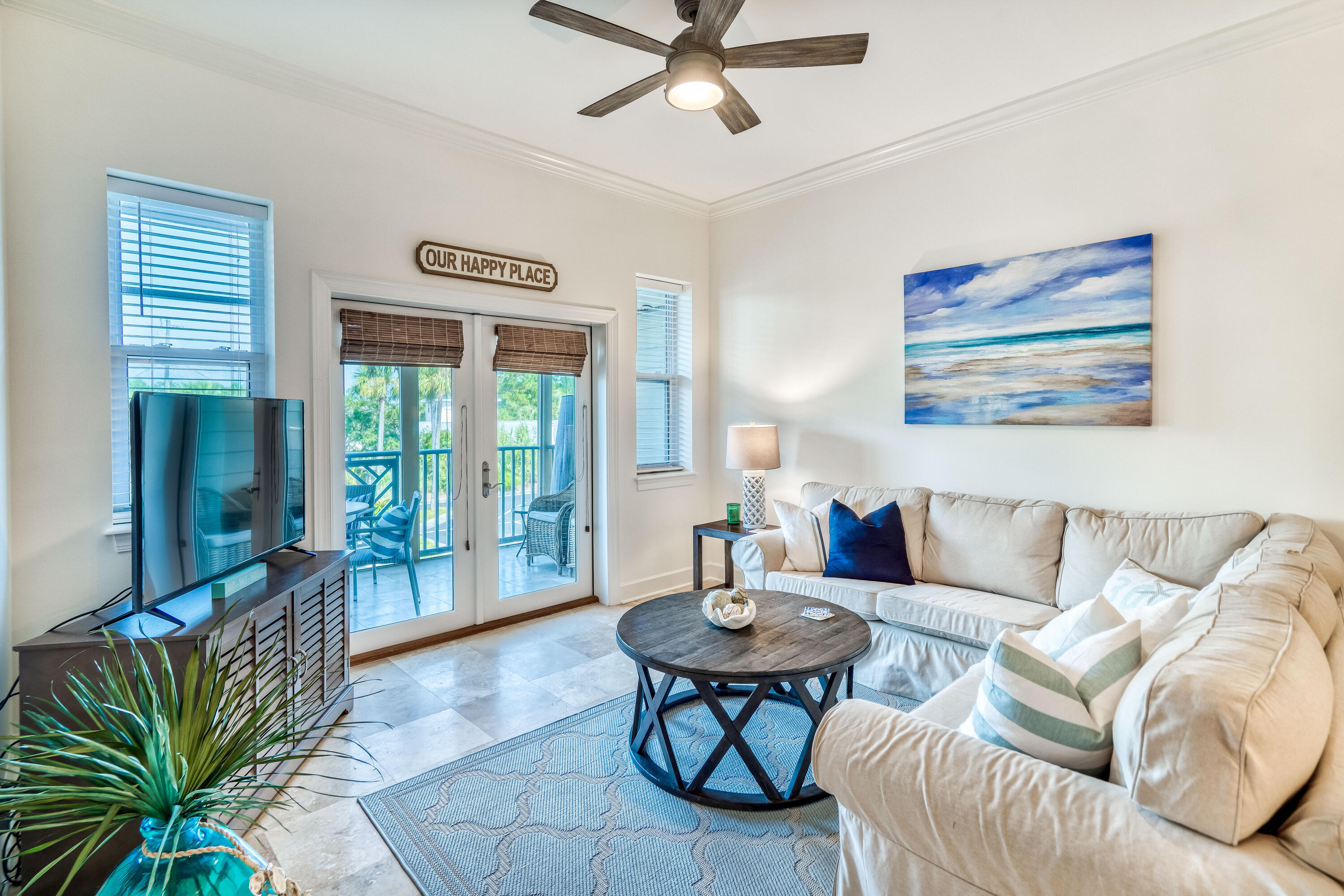 231 Somerset Bridge Road, Unit 1207 Santa Rosa Beach, FL 32459 - Photo 1 of 48 a living room with furniture a ceiling fan and a rug