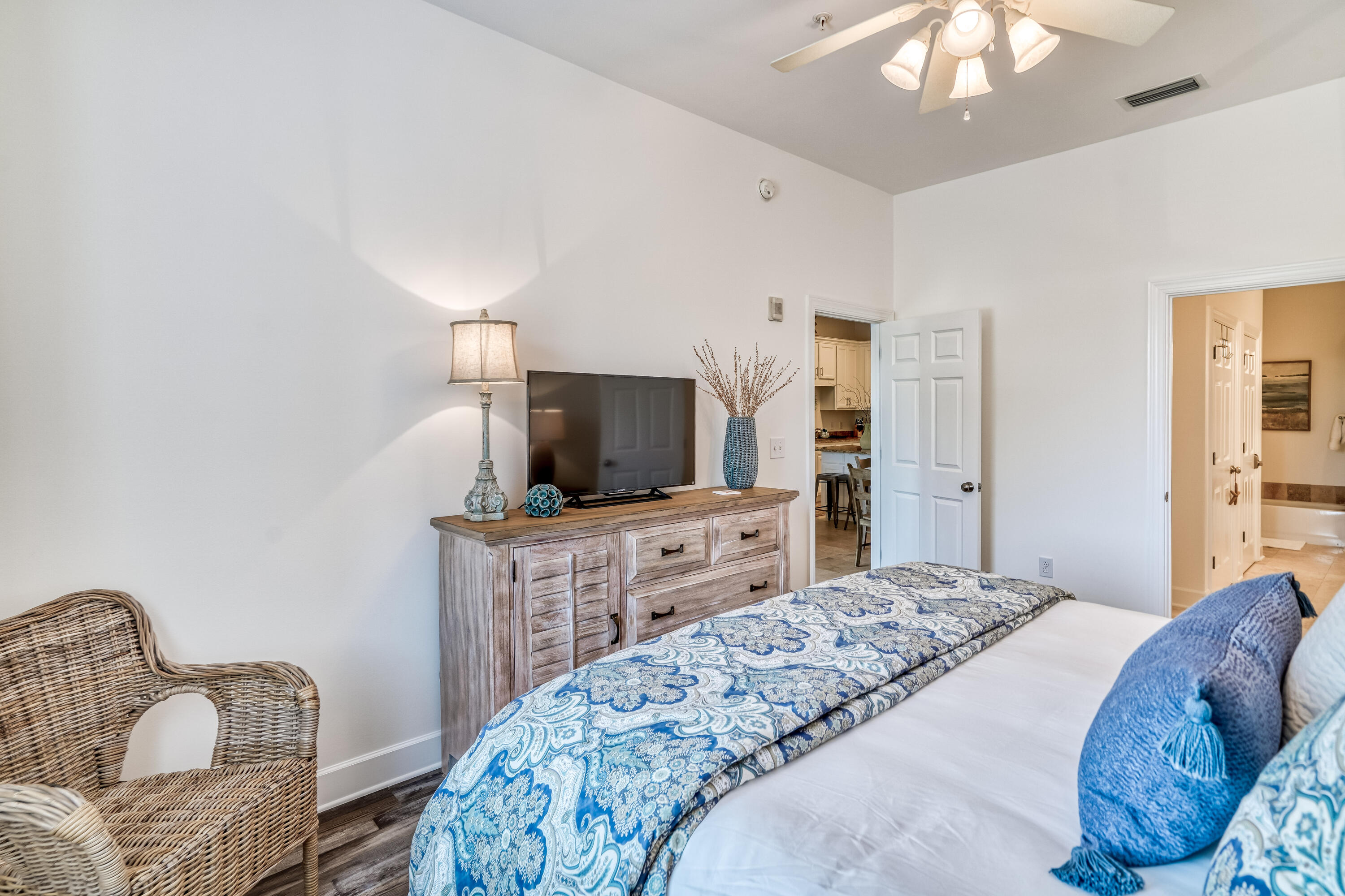 231 Somerset Bridge Road, Unit 1207 Santa Rosa Beach, FL 32459 - Photo 19 of 48 a bedroom with a bed and flat screen tv