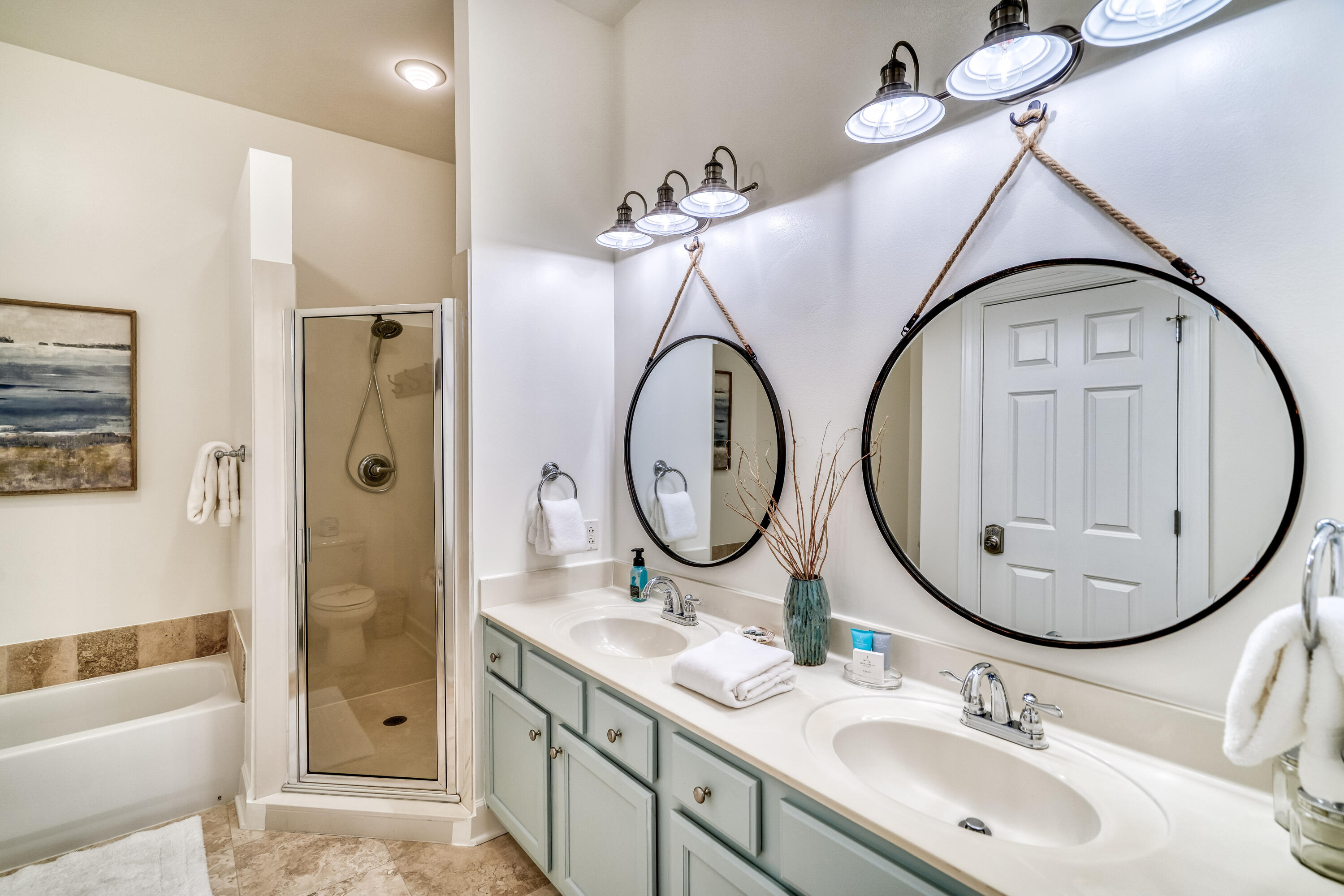 231 Somerset Bridge Road, Unit 1207 Santa Rosa Beach, FL 32459 - Photo 20 of 48 a bathroom with a double vanity sink mirror and shower