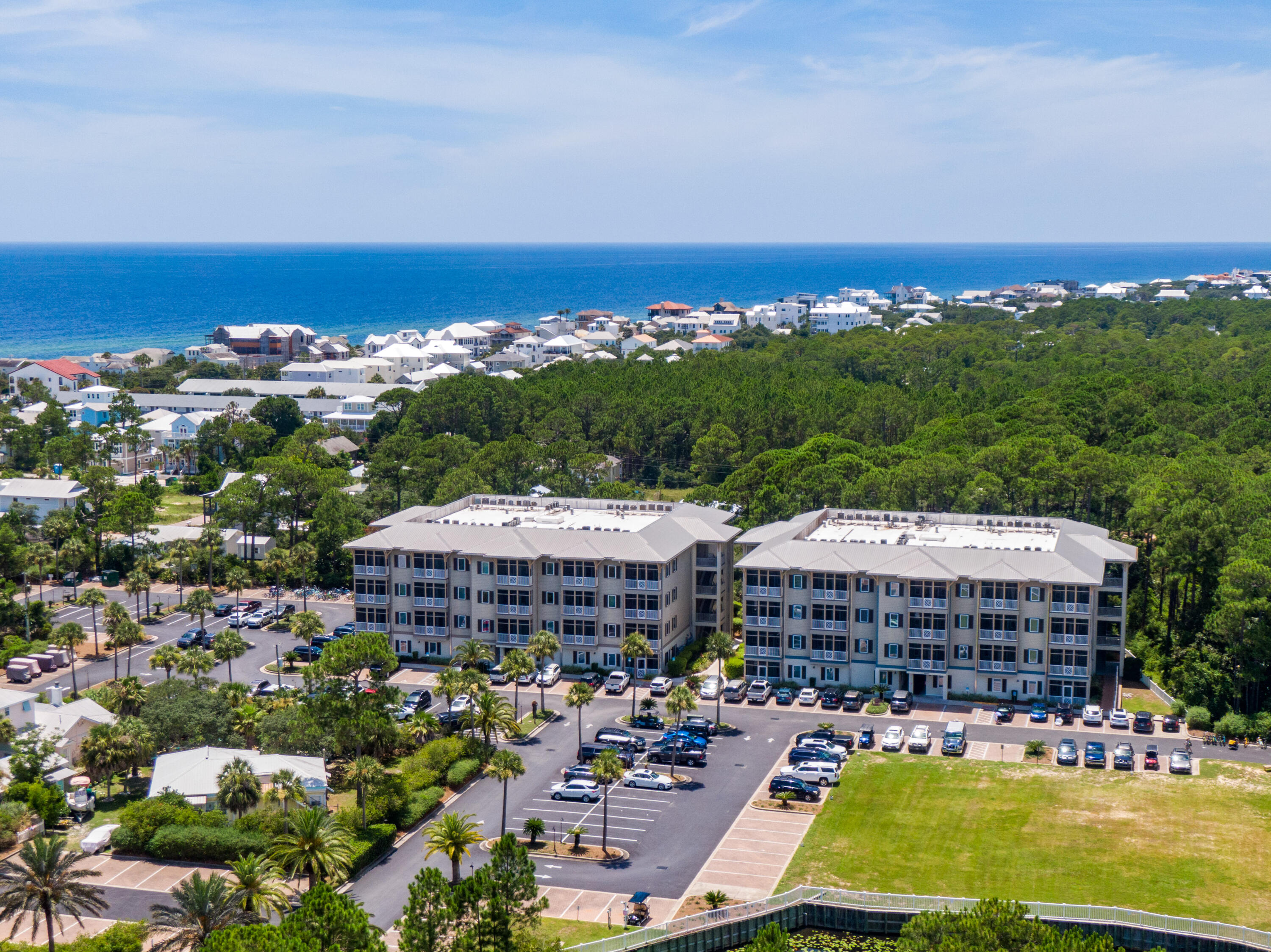 231 Somerset Bridge Road, Unit 1207 Santa Rosa Beach, FL 32459 - Photo 2 of 48 a view of a big room with large trees