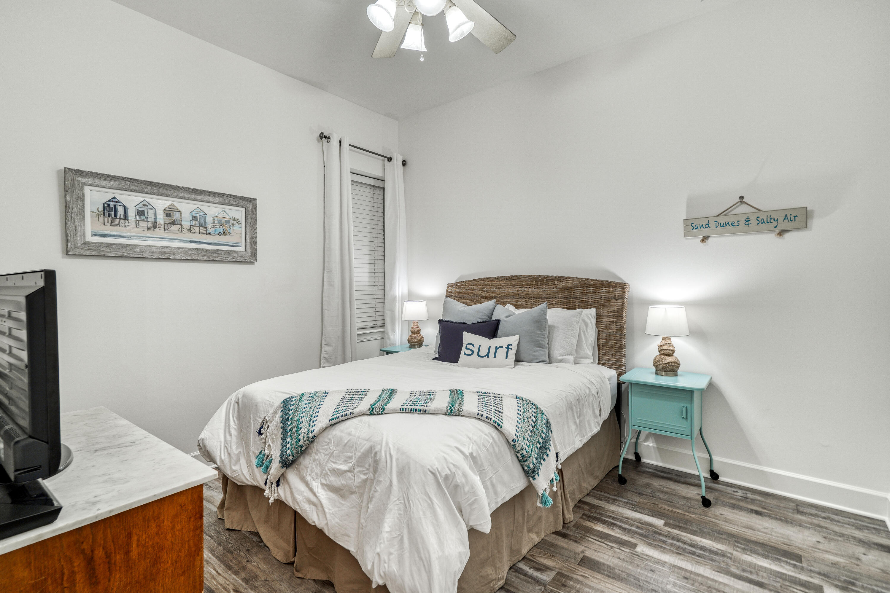 231 Somerset Bridge Road, Unit 1207 Santa Rosa Beach, FL 32459 - Photo 24 of 48 a bedroom with a bed and a flat screen tv