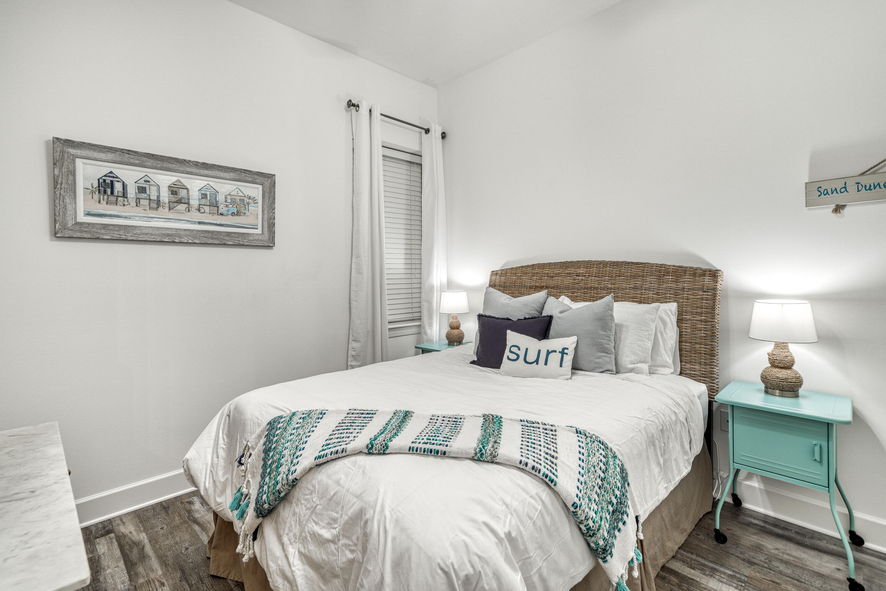 231 Somerset Bridge Road, Unit 1207 Santa Rosa Beach, FL 32459 - Photo 25 of 48 a bedroom with a bed and a lamp
