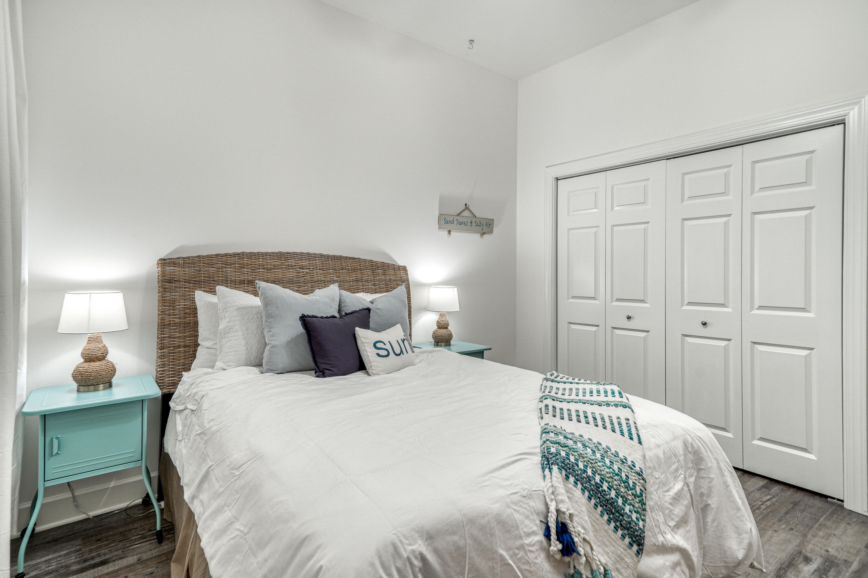 231 Somerset Bridge Road, Unit 1207 Santa Rosa Beach, FL 32459 - Photo 27 of 48 a bedroom with a bed and a lamp