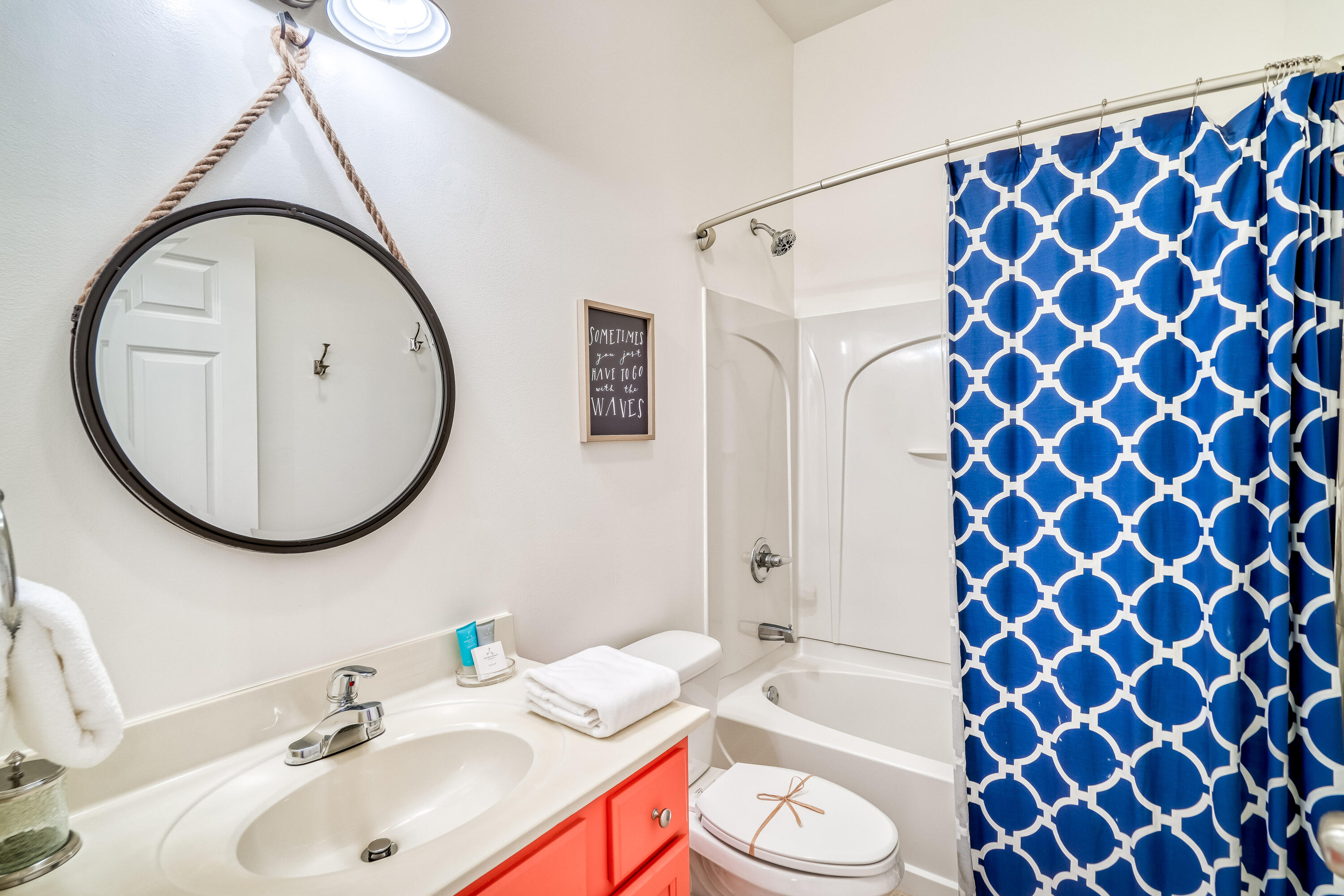 231 Somerset Bridge Road, Unit 1207 Santa Rosa Beach, FL 32459 - Photo 29 of 48 a bathroom with a sink and a mirror