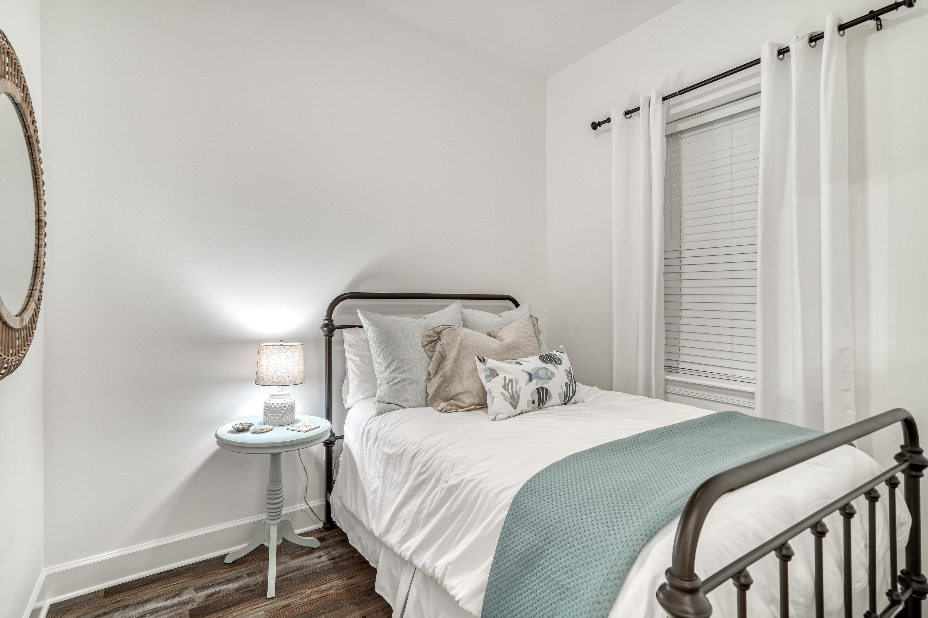 231 Somerset Bridge Road, Unit 1207 Santa Rosa Beach, FL 32459 - Photo 32 of 48 a bedroom with a bed and a table