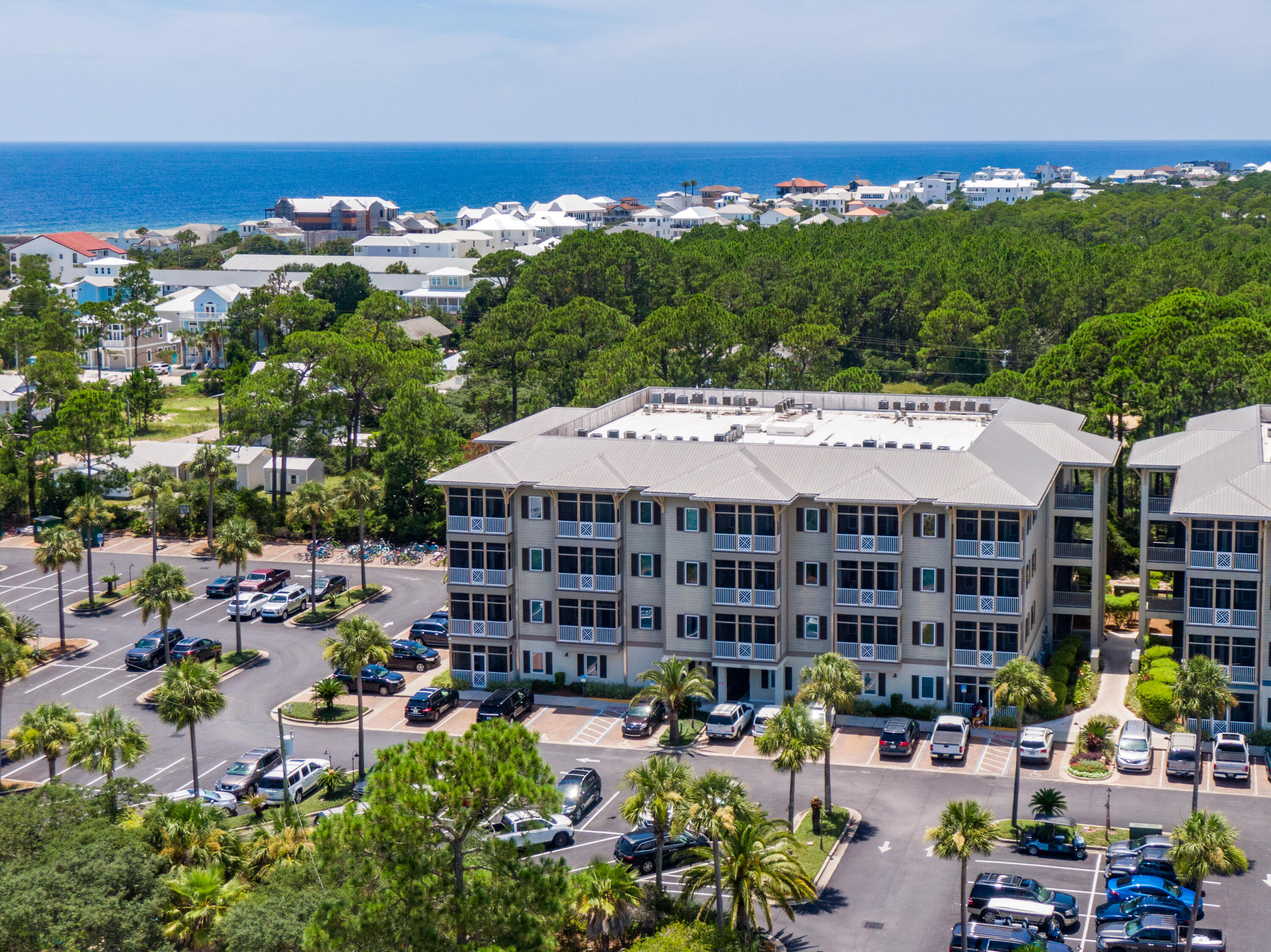 231 Somerset Bridge Road, Unit 1207 Santa Rosa Beach, FL 32459 - Photo 38 of 48 a view of a swimming pool with outdoor seating and a city view