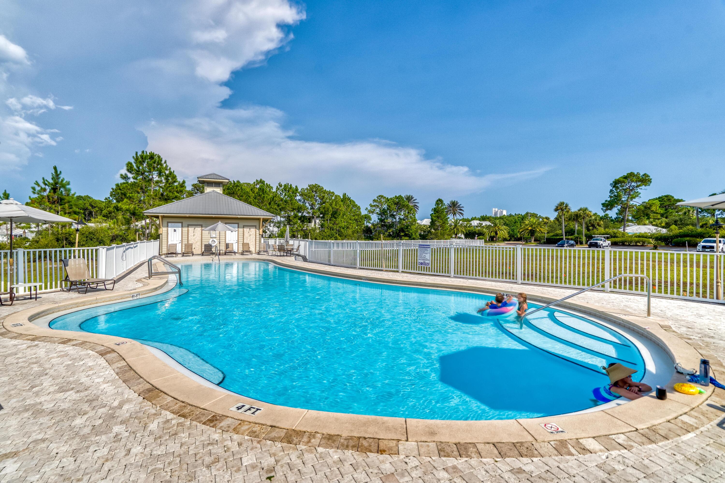 231 Somerset Bridge Road, Unit 1207 Santa Rosa Beach, FL 32459 - Photo 46 of 48 a view of a swimming pool with a yard
