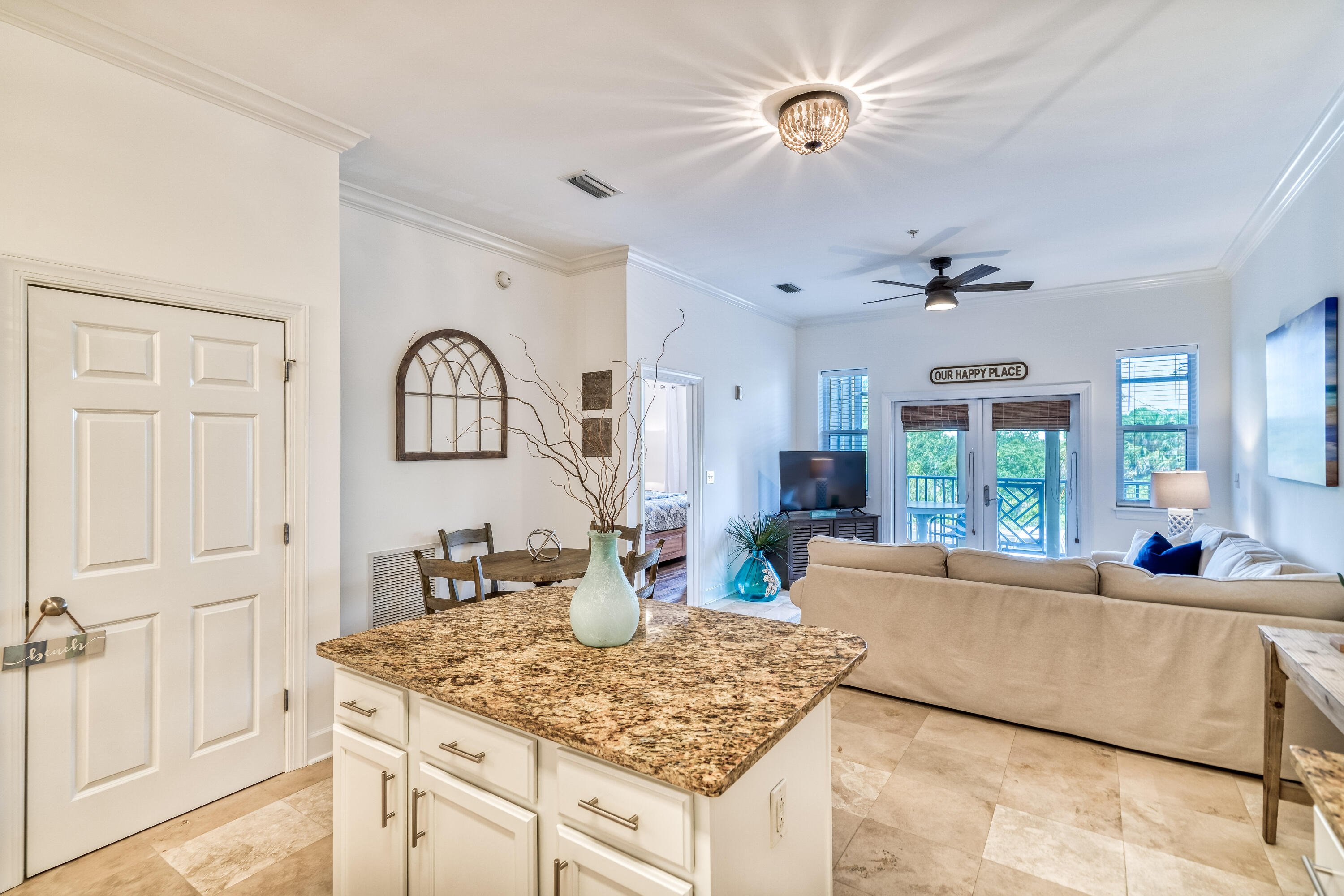 231 Somerset Bridge Road, Unit 1207 Santa Rosa Beach, FL 32459 - Photo 10 of 48 a living room with granite countertop furniture and a large window