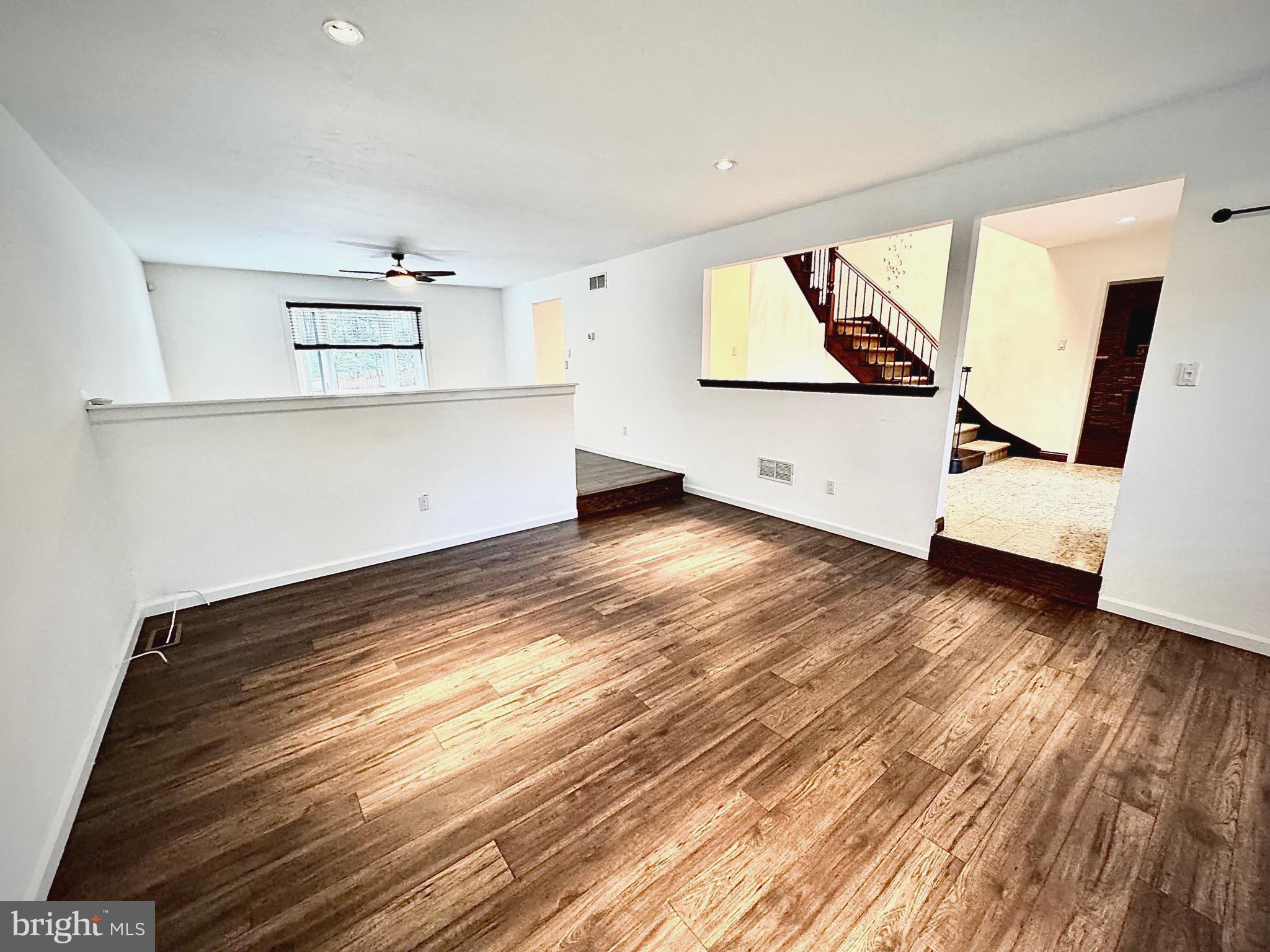 54 Las Brisas Boulevard Voorhees, NJ 08043 - Photo 16 of 67 a view of room with wooden floor and white walls