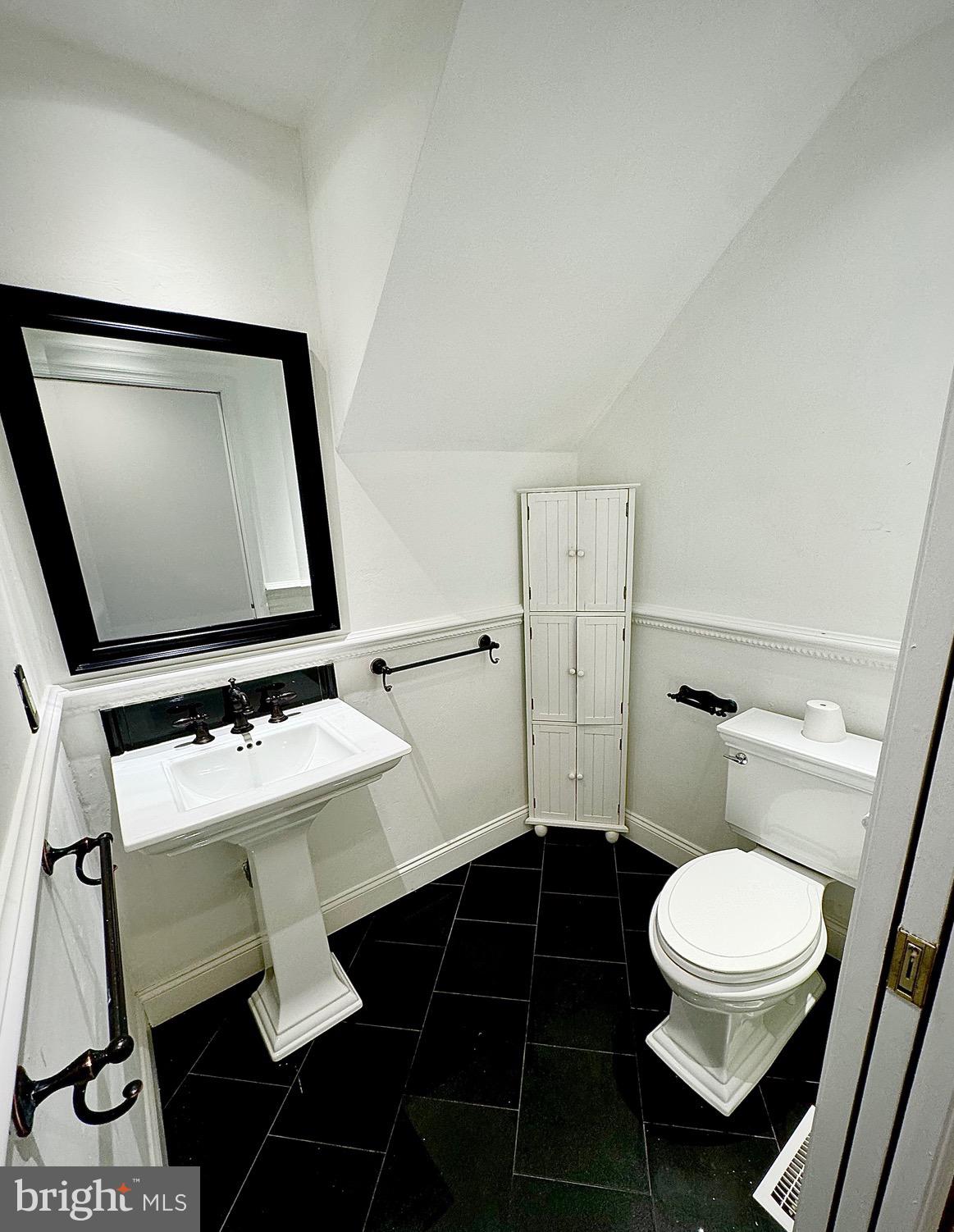 54 Las Brisas Boulevard Voorhees, NJ 08043 - Photo 20 of 67 a bathroom with a toilet a sink and a mirror