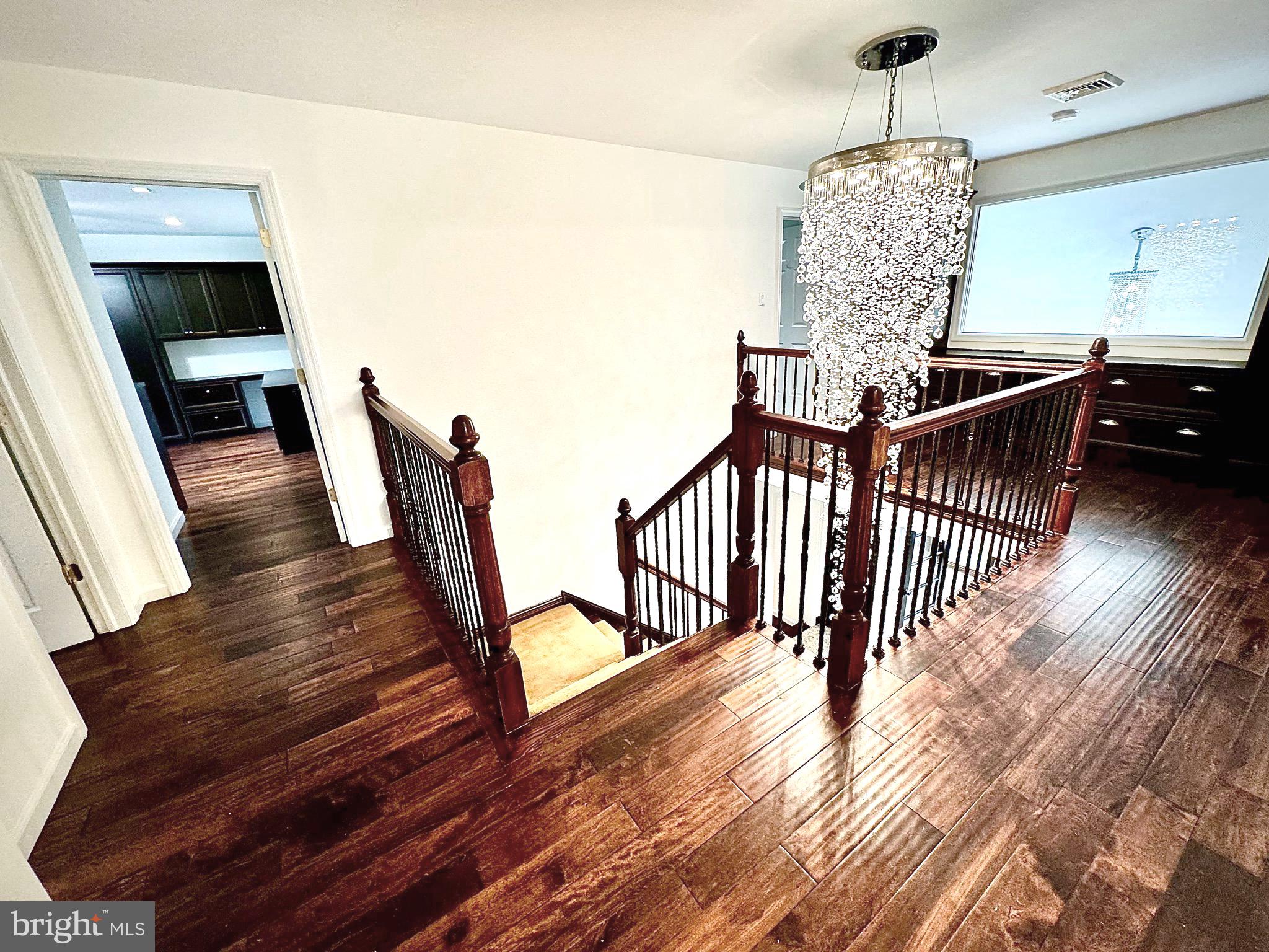54 Las Brisas Boulevard Voorhees, NJ 08043 - Photo 37 of 67 a view of entryway and hall with wooden floor