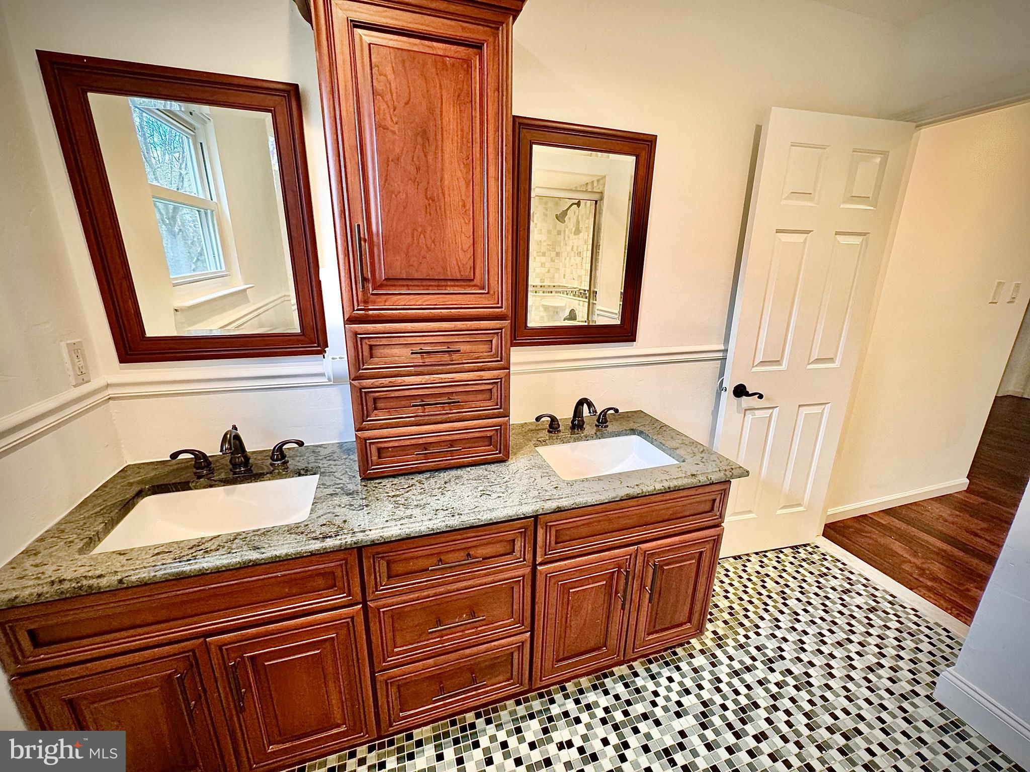 54 Las Brisas Boulevard Voorhees, NJ 08043 - Photo 40 of 67 a bathroom with a granite countertop sink and a mirror