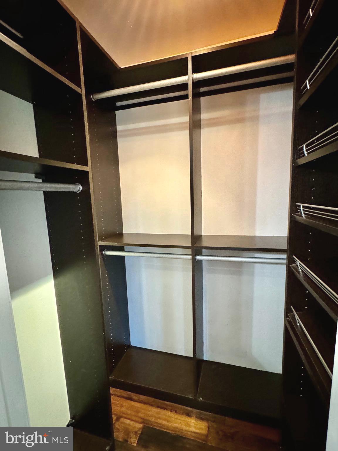 54 Las Brisas Boulevard Voorhees, NJ 08043 - Photo 43 of 67 a view of walk in closet with wooden floor