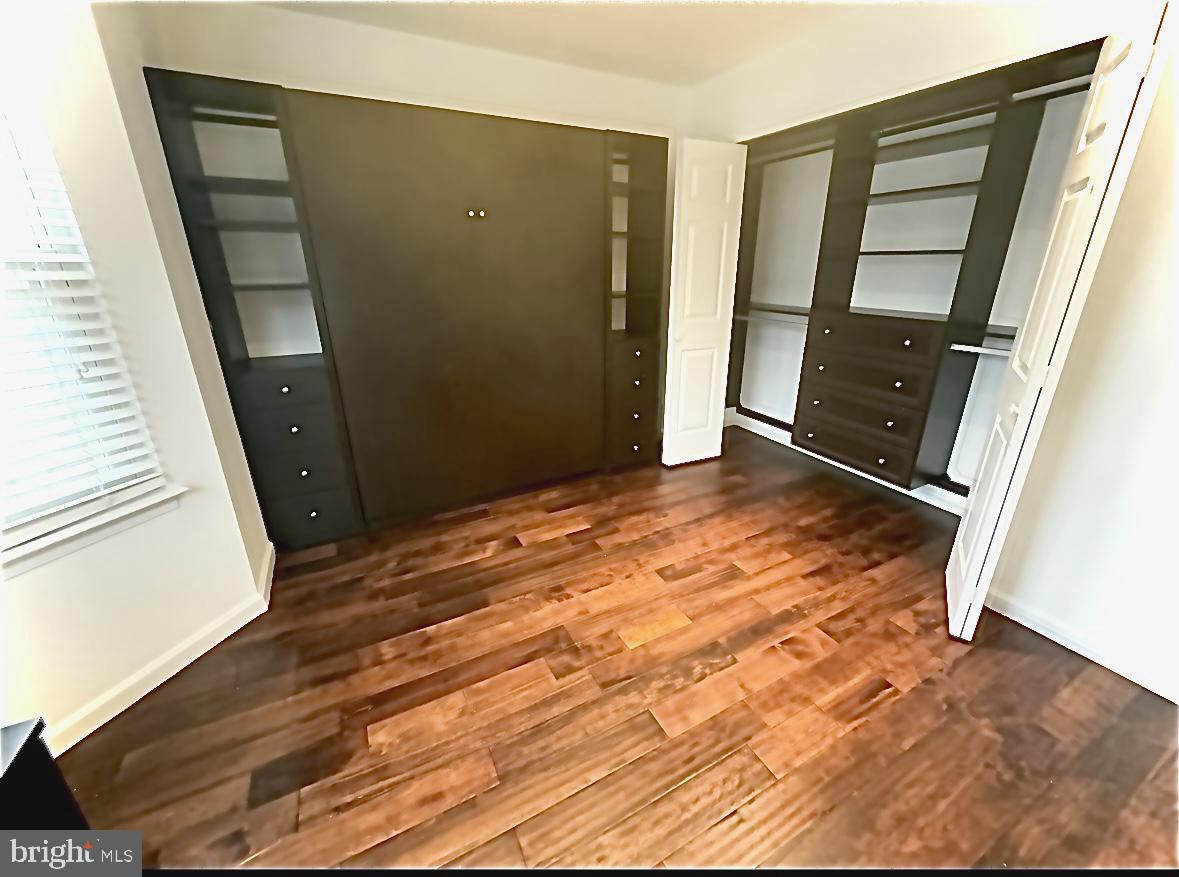 54 Las Brisas Boulevard Voorhees, NJ 08043 - Photo 47 of 67 a view of an empty room with wooden floor and a window