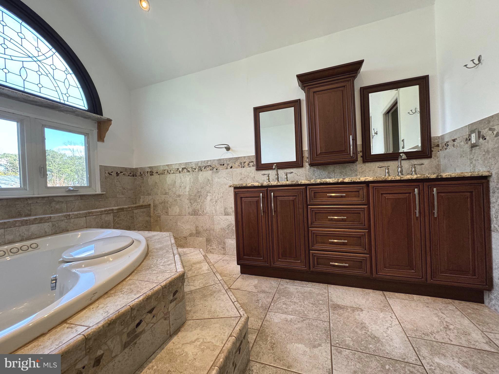 54 Las Brisas Boulevard Voorhees, NJ 08043 - Photo 53 of 67 a bathroom with a granite countertop double vanity sink a mirror and a