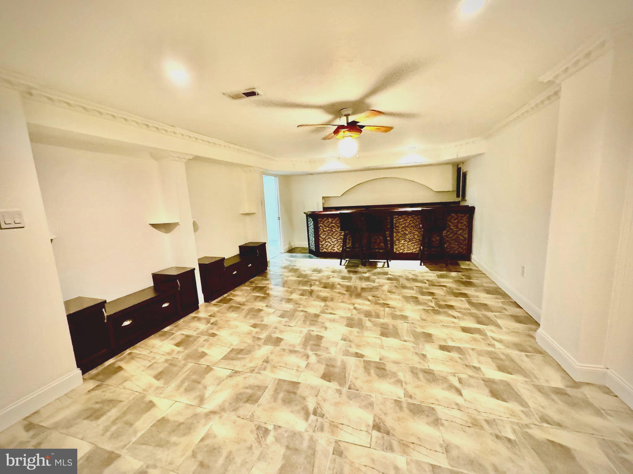 54 Las Brisas Boulevard Voorhees, NJ 08043 - Photo 65 of 67 a bedroom with a bed and a chandelier