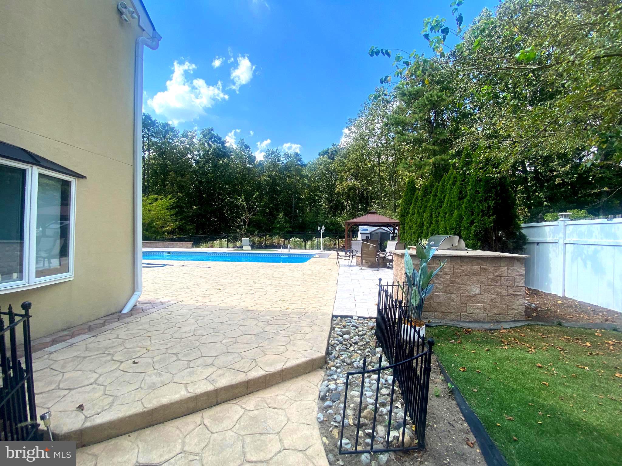 54 Las Brisas Boulevard Voorhees, NJ 08043 - Photo 8 of 67 a view of a house with backyard and sitting area