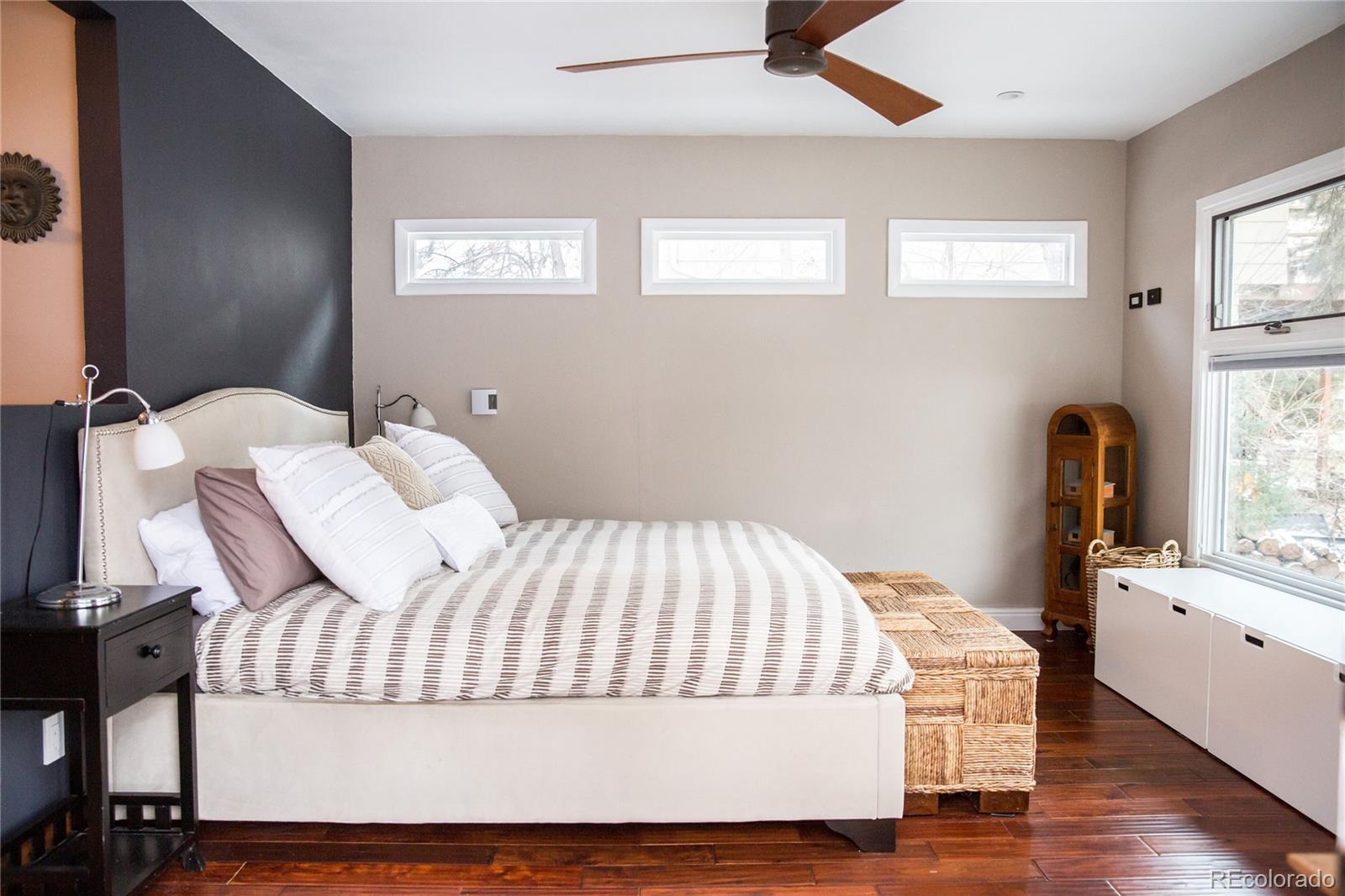983 Cherryvale Road Boulder, CO 80303 - Photo 25 of 36 a bedroom with a bed and wooden floor