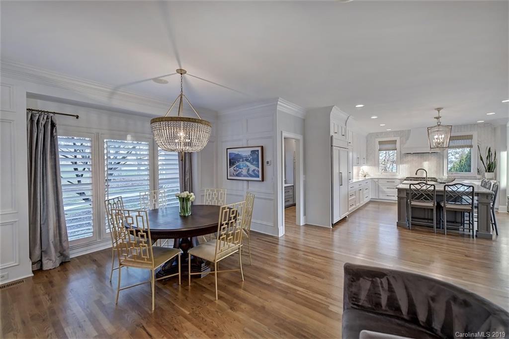 188 Chatham Road Mooresville, NC 28117 - Photo 11 of 48 a view of a dining room with furniture window and wooden floor