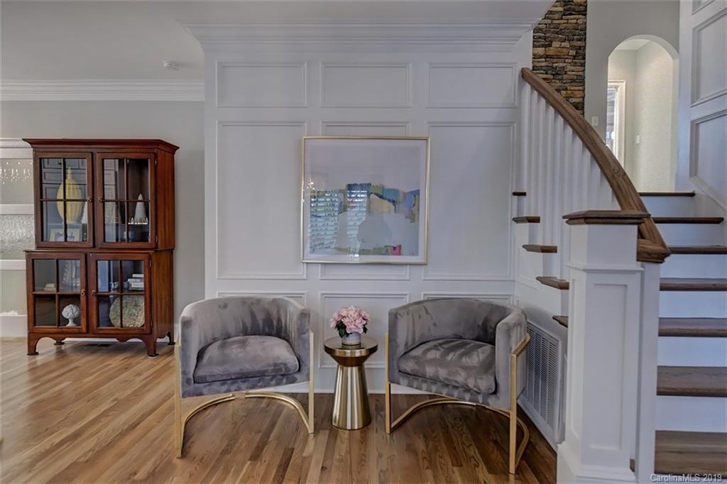 188 Chatham Road Mooresville, NC 28117 - Photo 12 of 48 a living room with furniture and a wooden floor