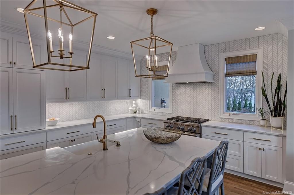 188 Chatham Road Mooresville, NC 28117 - Photo 15 of 48 a kitchen that has a lot of cabinets in it