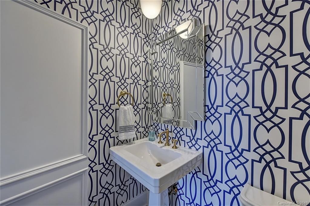 188 Chatham Road Mooresville, NC 28117 - Photo 18 of 48 a bathroom with a sink and a mirror