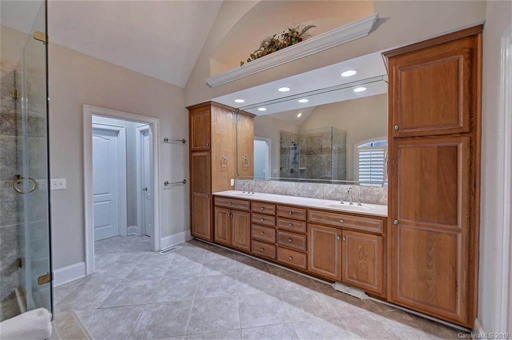 188 Chatham Road Mooresville, NC 28117 - Photo 27 of 48 a bathroom with a double vanity sink and mirror