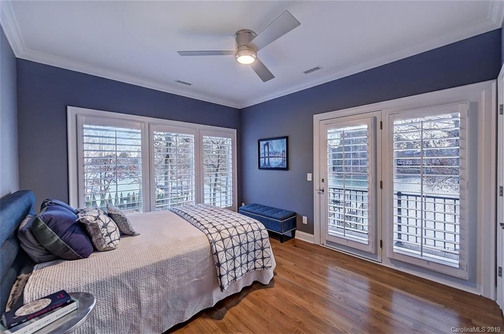 188 Chatham Road Mooresville, NC 28117 - Photo 30 of 48 a bedroom with a large bed and a large window