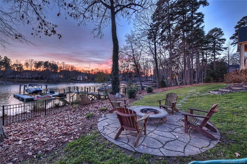 188 Chatham Road Mooresville, NC 28117 - Photo 41 of 48 a view of a table and chairs in backyard of the house