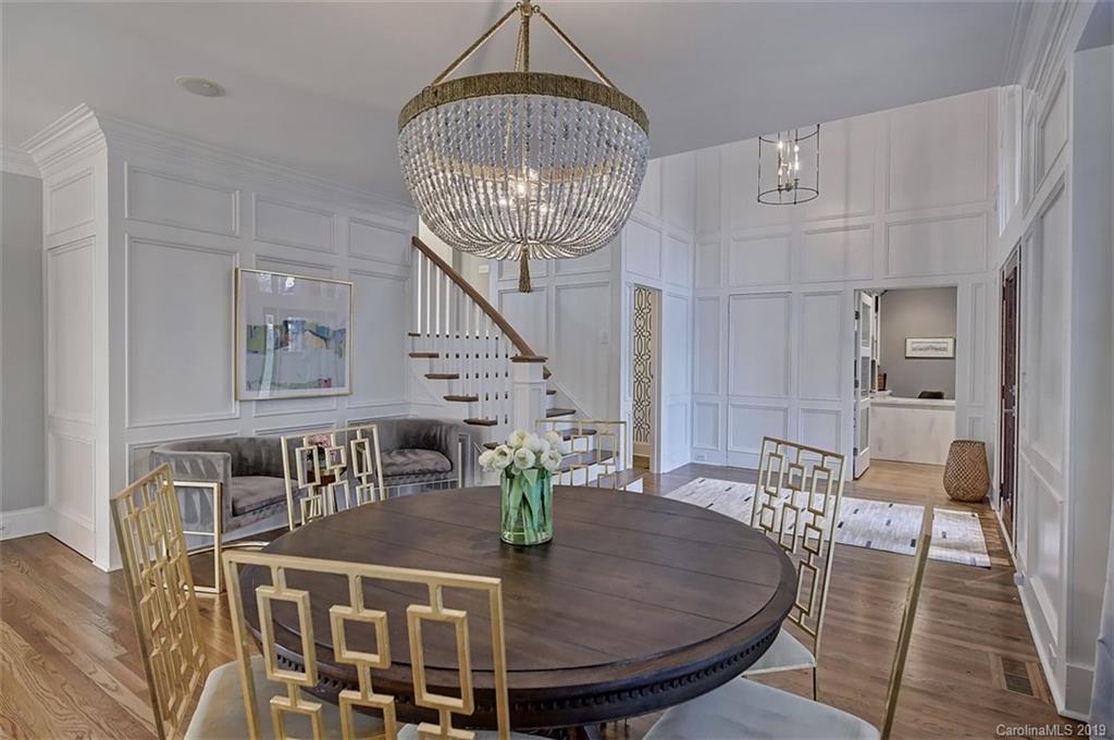 188 Chatham Road Mooresville, NC 28117 - Photo 10 of 48 a dining room with furniture a chandelier and wooden floor