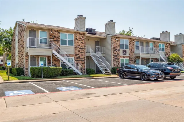 a car parked in front of a building