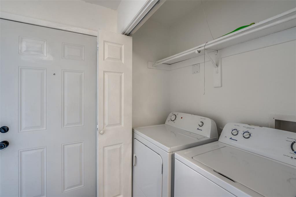 2200 East Trinity Mills Road, Unit 206 Carrollton, TX 75006 - Photo 24 of 24 a view of storage and utility room with washer and dryer