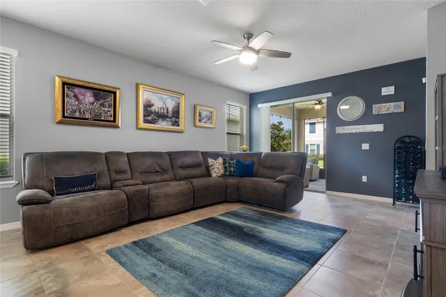 a bathroom with a granite countertop toilet a sink and a mirror