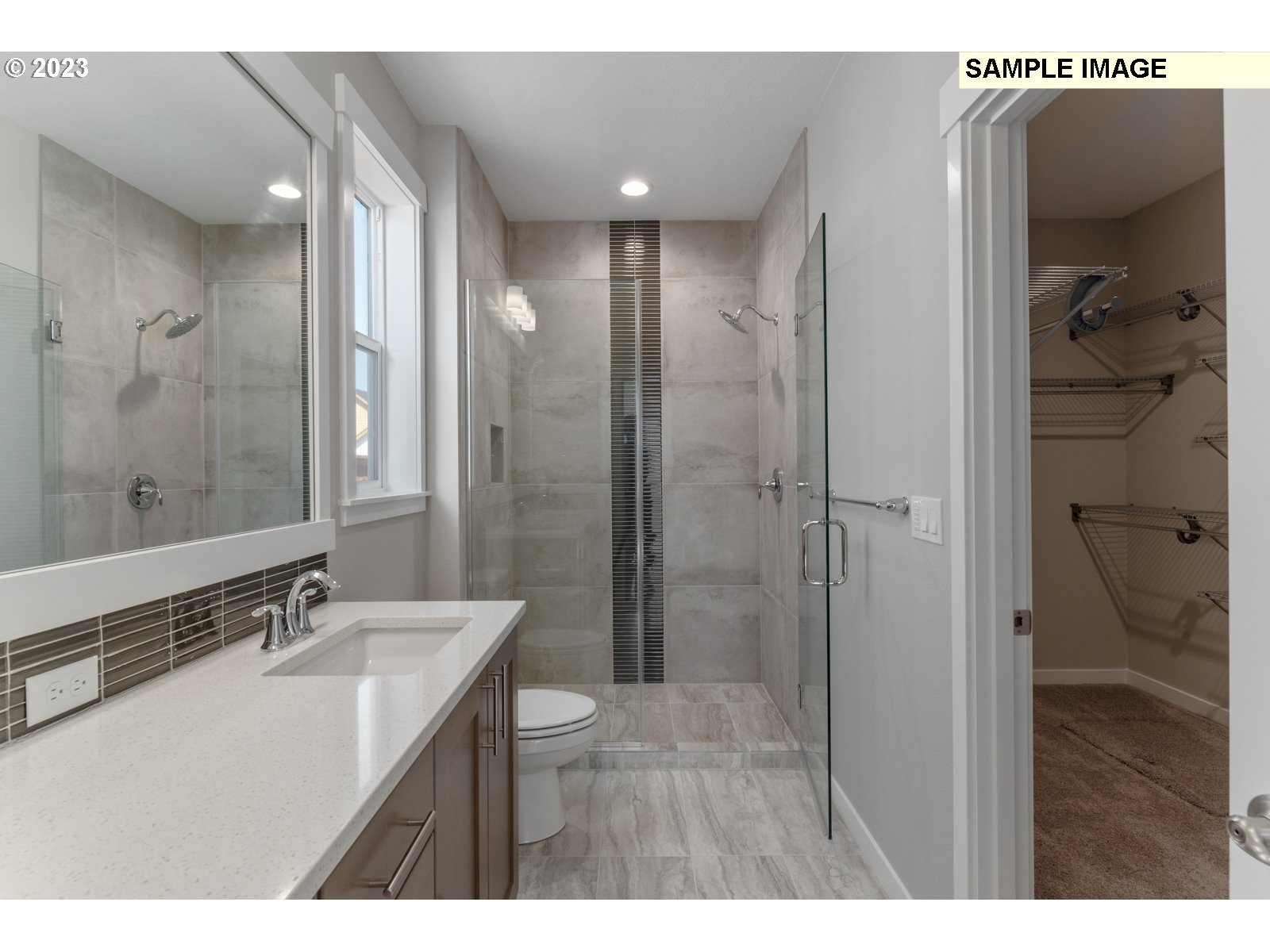 8853 North 5th Street, Unit 62 Ridgefield, WA 98642 - Photo 9 of 27 a bathroom with a sink a toilet and shower