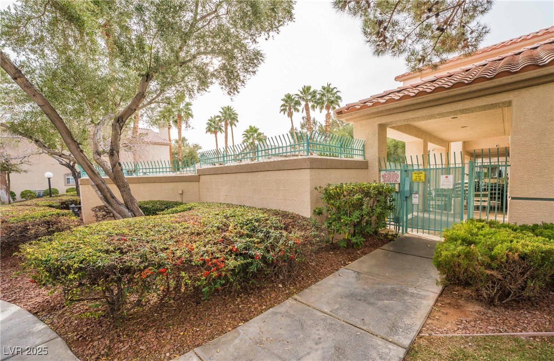 5415 West Harmon Avenue, Unit 1162 Las Vegas, NV 89103 - Photo 20 of 21 View of community featuring a gate