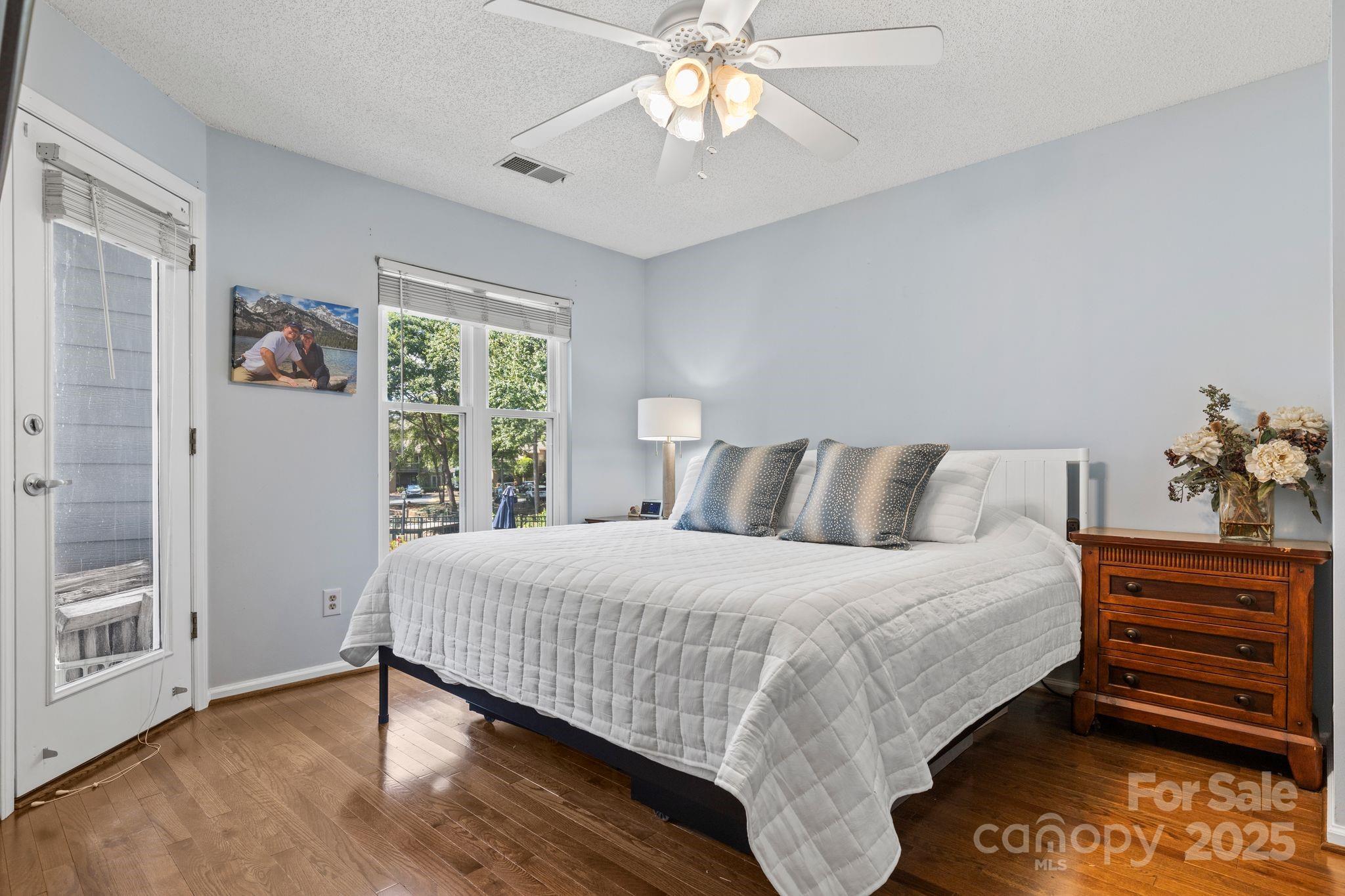 719 Southwest Drive Davidson, NC 28036 - Photo 11 of 27 a bedroom with a bed and a window