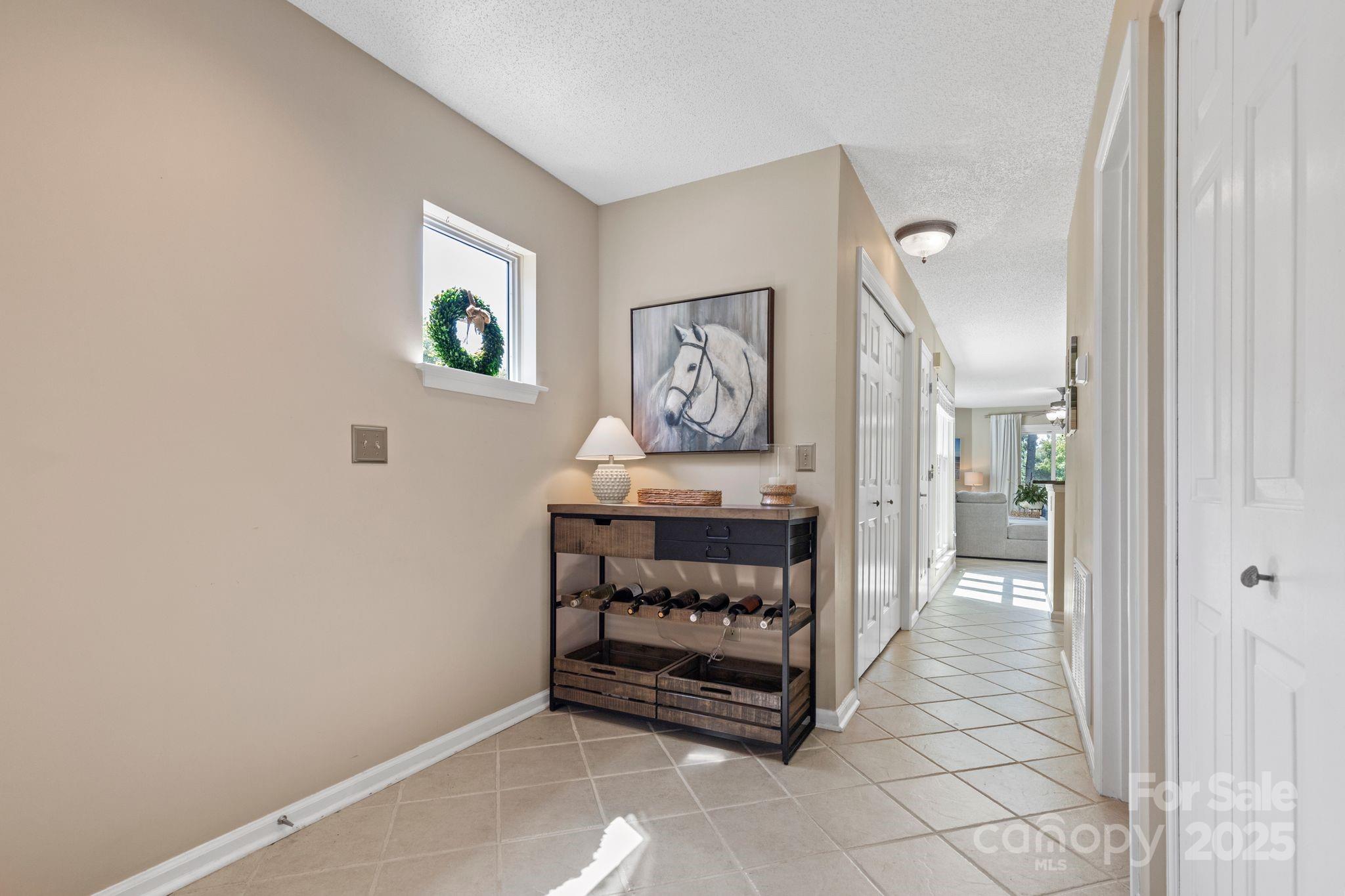 719 Southwest Drive Davidson, NC 28036 - Photo 14 of 27 a view of room with painting on the wall