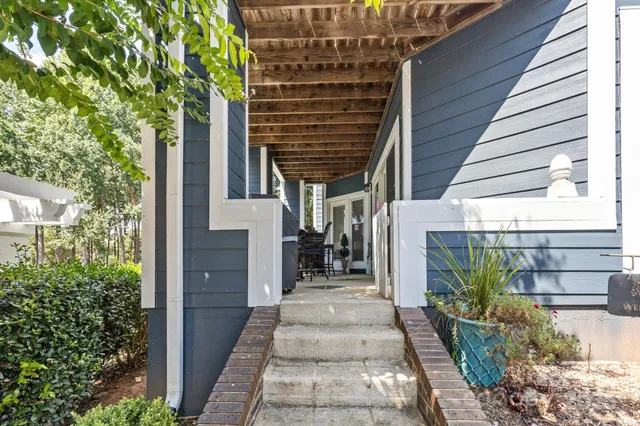 a view of swimming pool with a yard