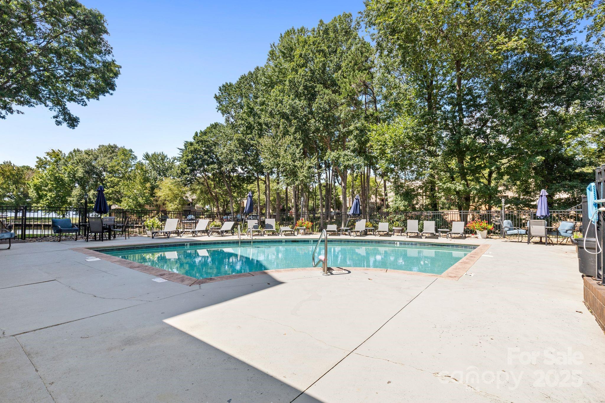 719 Southwest Drive Davidson, NC 28036 - Photo 20 of 27 a view of swimming pool with a yard