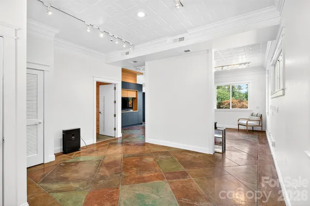 a view of livingroom with hardwood floor and a sink